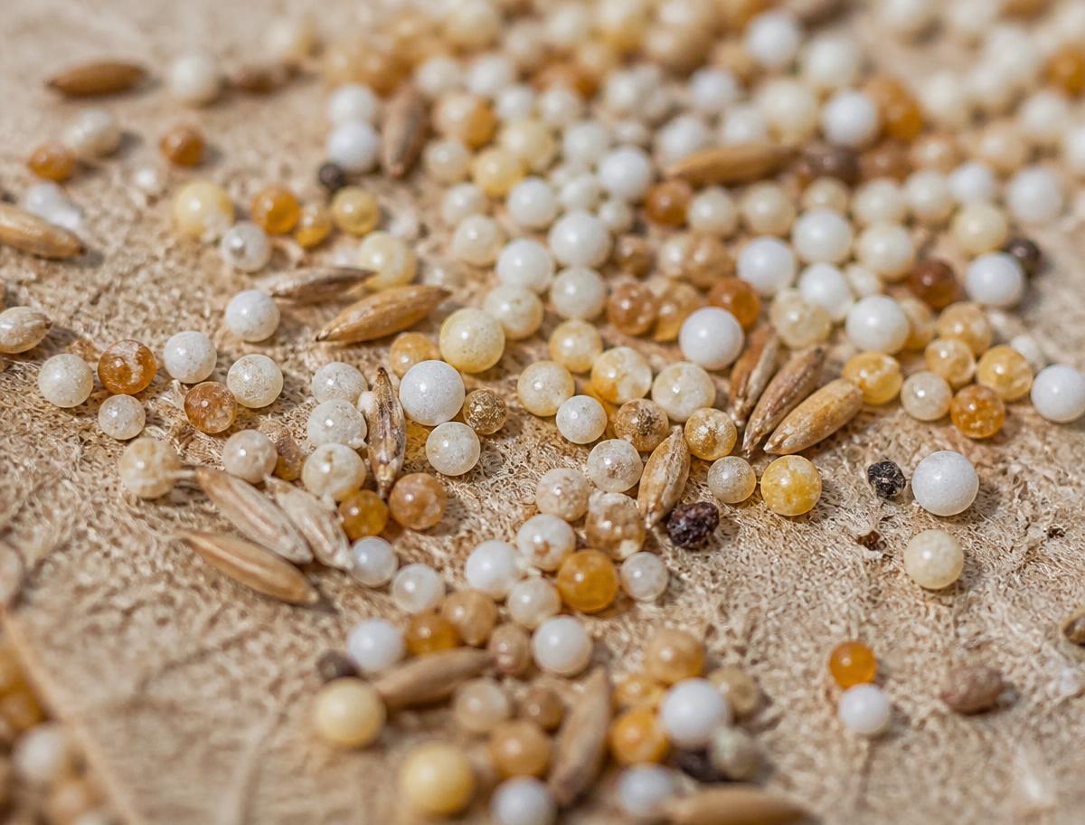 Macro shot of starter fertilizer micro-pellets in the roll
